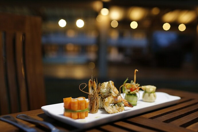 Imagen del bar/restaurante del Hotel The Beach Boutique. Foto 17