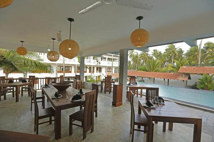 Imagen del bar/restaurante del Hotel The Beach Boutique. Foto 18