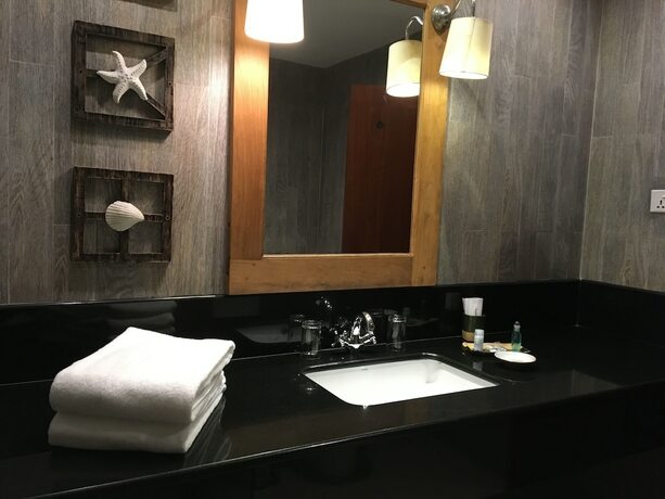 Imagen de la habitación del Hotel The Beach Boutique. Foto 19