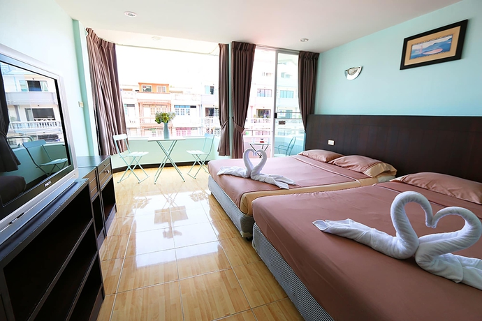 Imagen de la habitación del Hotel The Beach Cha Am Suite. Foto 6