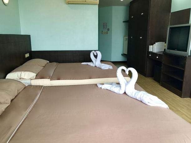 Imagen de la habitación del Hotel The Beach Cha Am Suite. Foto 8