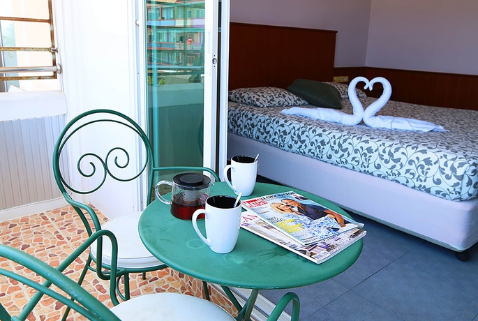 Imagen de la habitación del Hotel The Beach Cha Am Suite. Foto 13