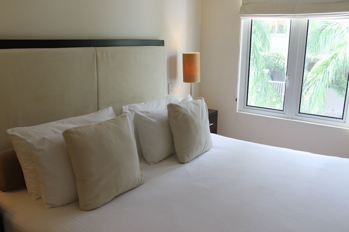 Imagen de la habitación del Hotel The Beach Club Luxury Private Apartments. Foto 16