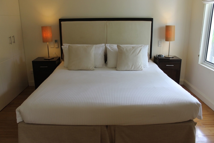 Imagen de la habitación del Hotel The Beach Club Luxury Private Apartments. Foto 17