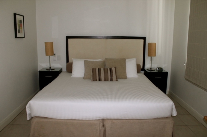 Imagen de la habitación del Hotel The Beach Club Luxury Private Apartments. Foto 18