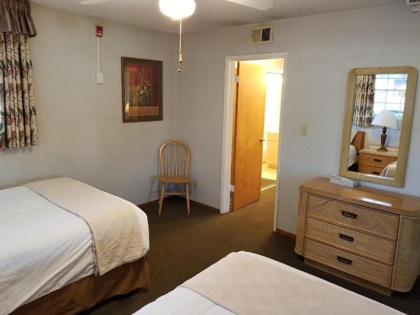 Imagen de la habitación del Hotel The Beach Cottages. Foto 2