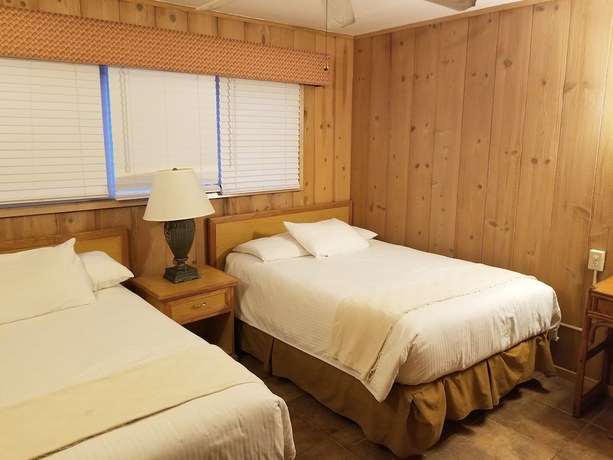 Imagen de la habitación del Hotel The Beach Cottages. Foto 4