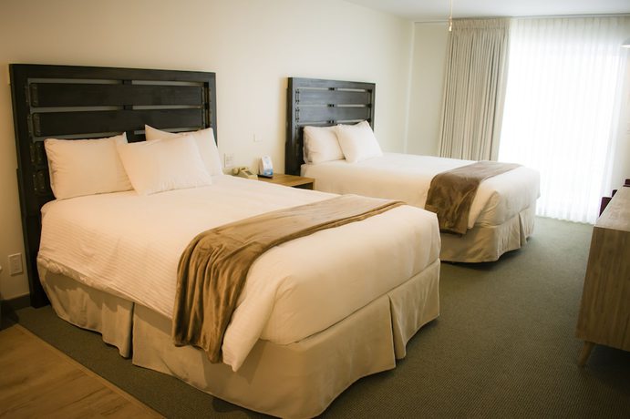 Imagen de la habitación del Hotel The Beach Cottages. Foto 5