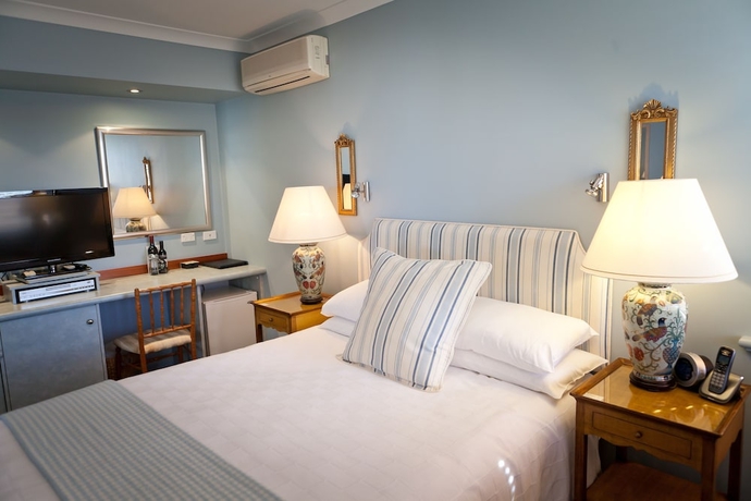 Imagen de la habitación del Hotel The Beach House At Bayside. Foto 17