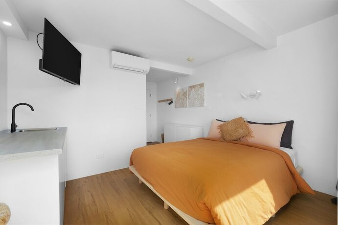 Imagen de la habitación del Hotel The Beach Rooms. Foto 20