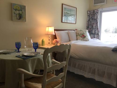Imagen de la habitación del Hotel The Beach Rose Inn. Foto 11