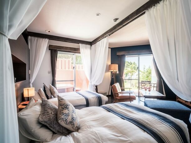 Imagen de la habitación del Hotel The Beach Terrace Ao Ishigaki. Foto 13