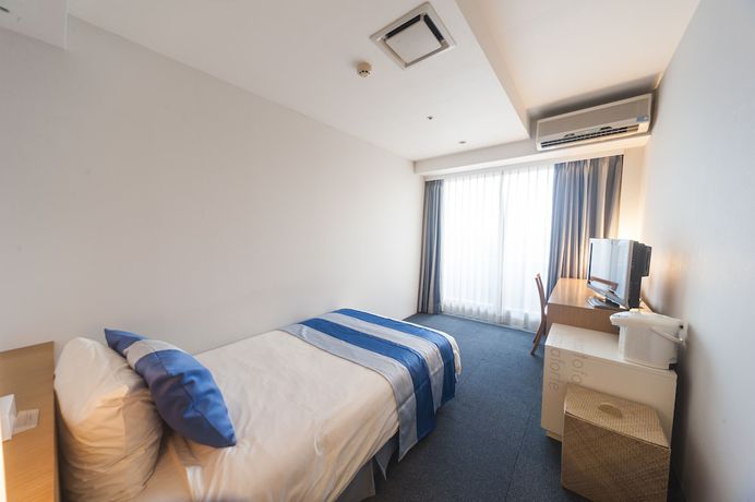 Imagen de la habitación del Hotel The Beach Tower Okinawa. Foto 3