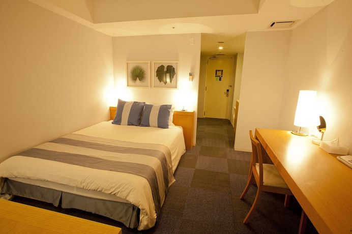 Imagen de la habitación del Hotel The Beach Tower Okinawa. Foto 5