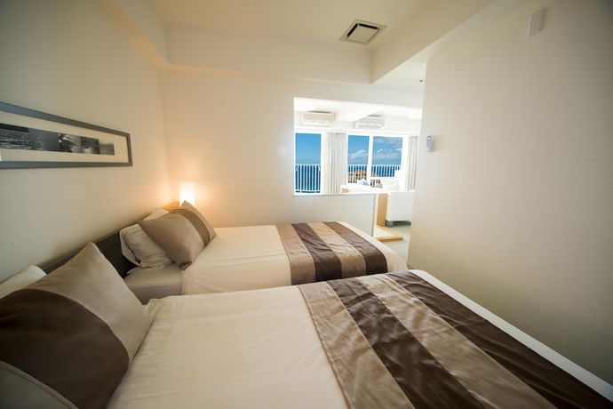 Imagen de la habitación del Hotel The Beach Tower Okinawa. Foto 7