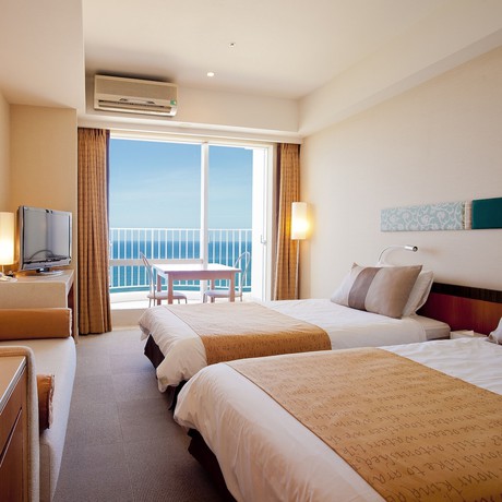 Imagen de la habitación del Hotel The Beach Tower Okinawa. Foto 11