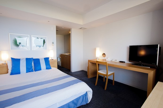 Imagen de la habitación del Hotel The Beach Tower Okinawa. Foto 17
