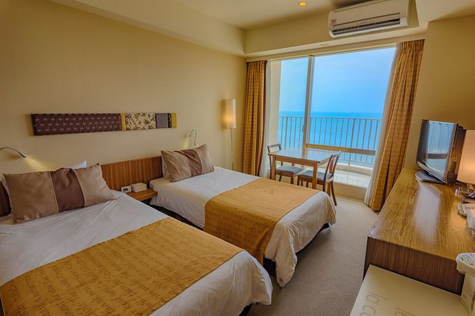 Imagen de la habitación del Hotel The Beach Tower Okinawa. Foto 18