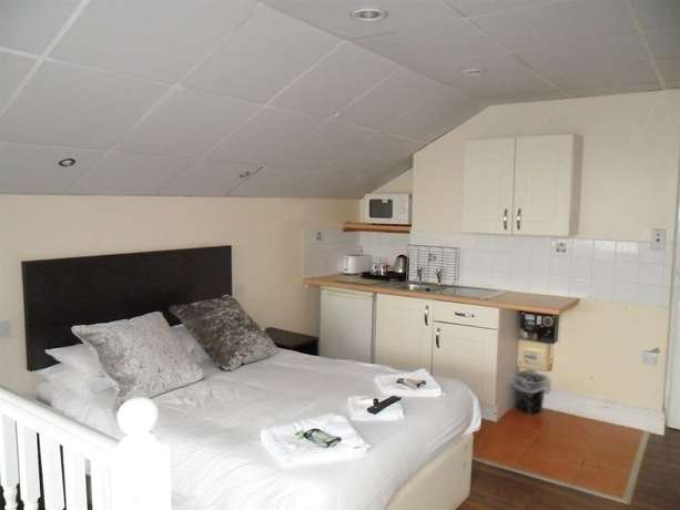 Imagen de la habitación del Hotel The Beach and Apartments. Foto 8