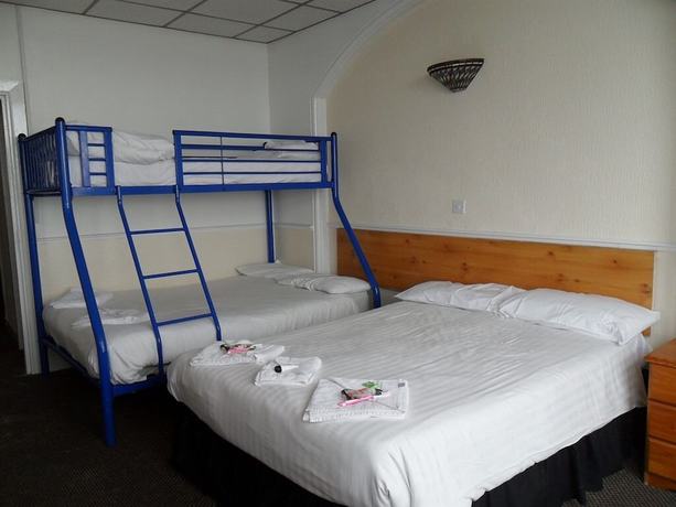 Imagen de la habitación del Hotel The Beach and Apartments. Foto 11