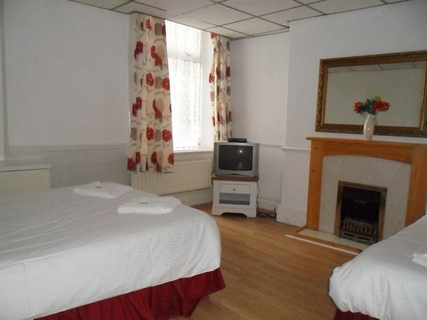 Imagen de la habitación del Hotel The Beach and Apartments. Foto 14