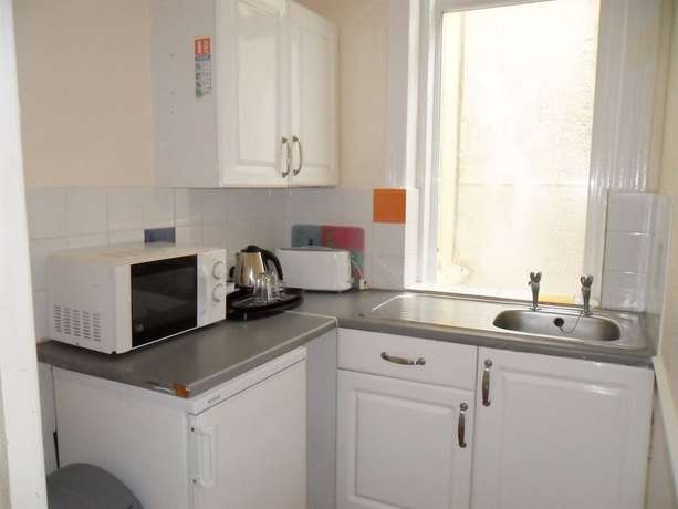 Imagen de la habitación del Hotel The Beach and Apartments. Foto 19
