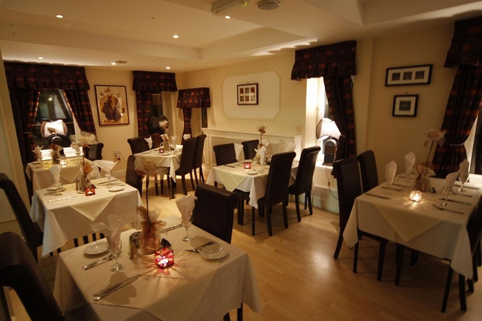 Imagen del bar/restaurante del Hotel The Beaches. Foto 5