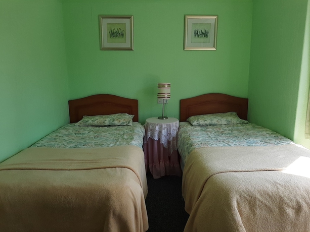 Imagen de la habitación del Hotel The Beaches Family BandB. Foto 9