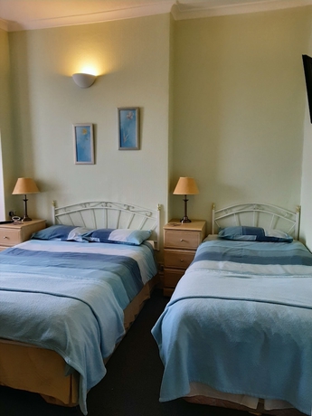Imagen de la habitación del Hotel The Beaches Family BandB. Foto 10