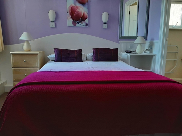 Imagen de la habitación del Hotel The Beaches Family BandB. Foto 12