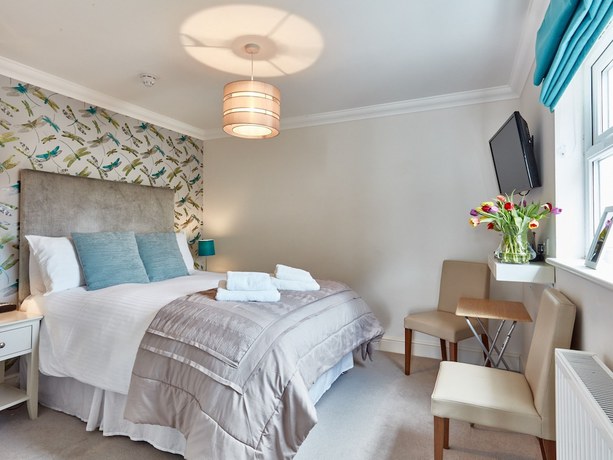 Imagen de la habitación del Hotel The Beaches Guest House. Foto 4