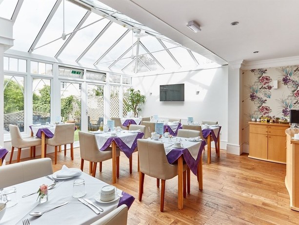 Imagen del bar/restaurante del Hotel The Beaches Guest House. Foto 3