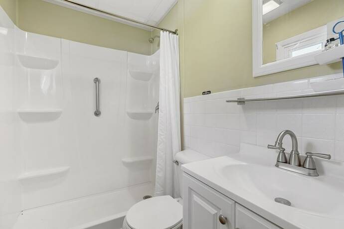 Imagen de la habitación del Hotel The Beaches Guest Rooms and Cottages. Foto 18