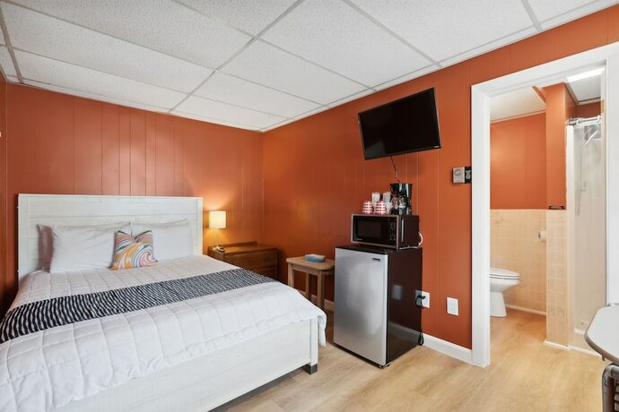 Imagen de la habitación del Hotel The Beaches Guest Rooms and Cottages. Foto 19