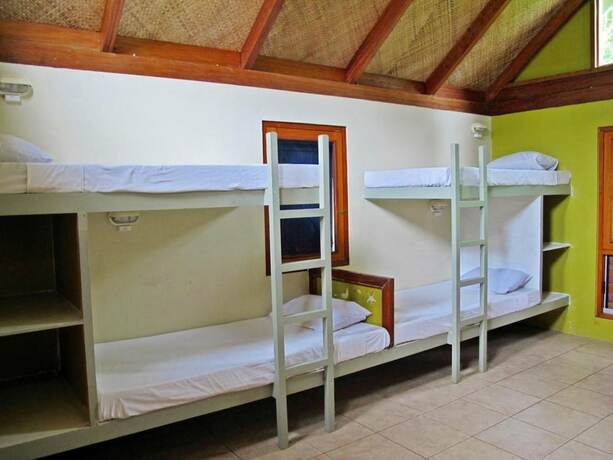 Imagen de la habitación del Hotel The Beachouse. Foto 13