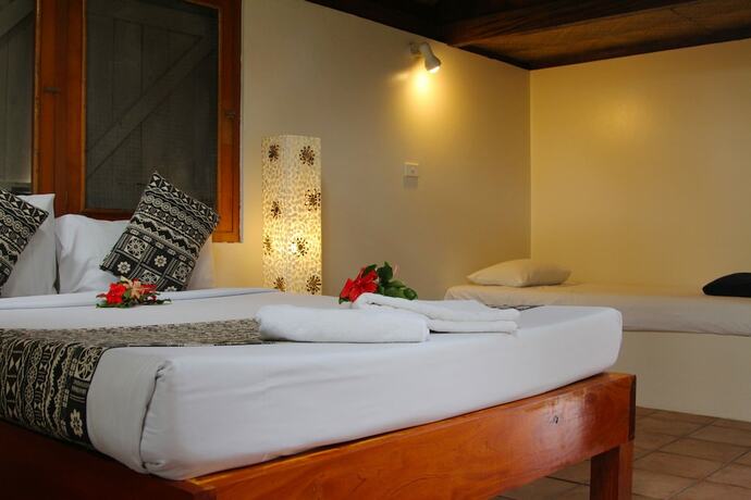 Imagen de la habitación del Hotel The Beachouse. Foto 18
