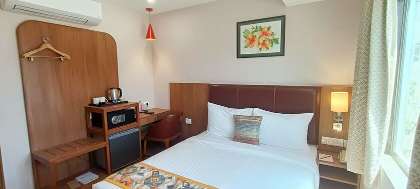 Imagen de la habitación del Hotel The Beacon Vadodara. Foto 14