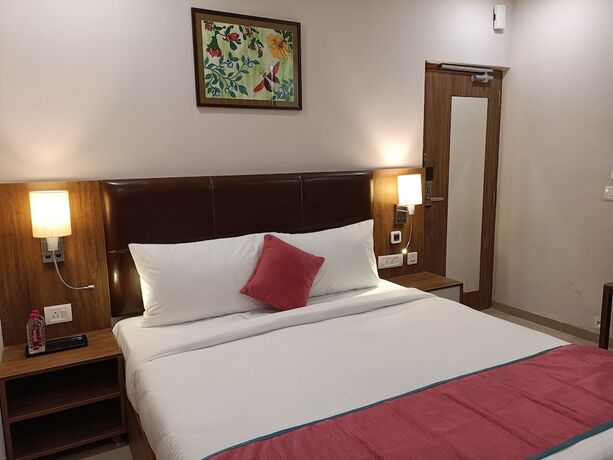 Imagen de la habitación del Hotel The Beacon Vadodara. Foto 18