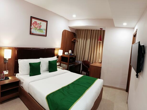Imagen de la habitación del Hotel The Beacon Vadodara. Foto 19