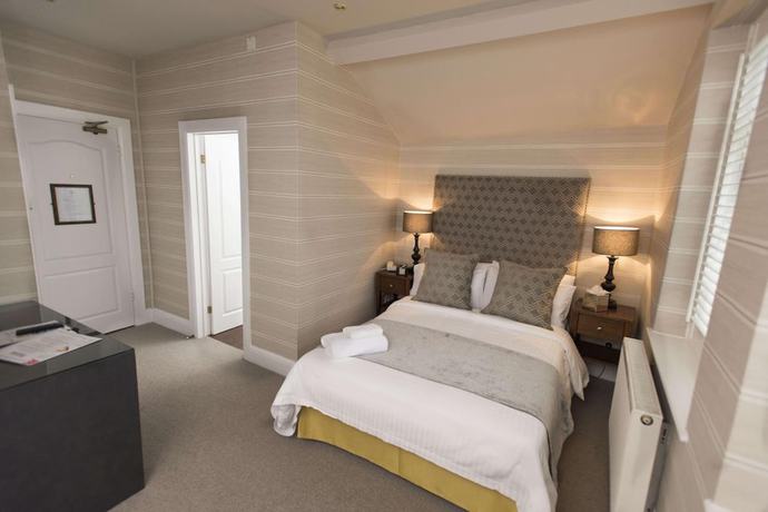 Imagen de la habitación del Hotel The Bear. Foto 2