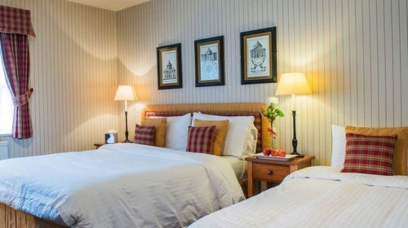 Imagen de la habitación del Hotel The Bear. Foto 6