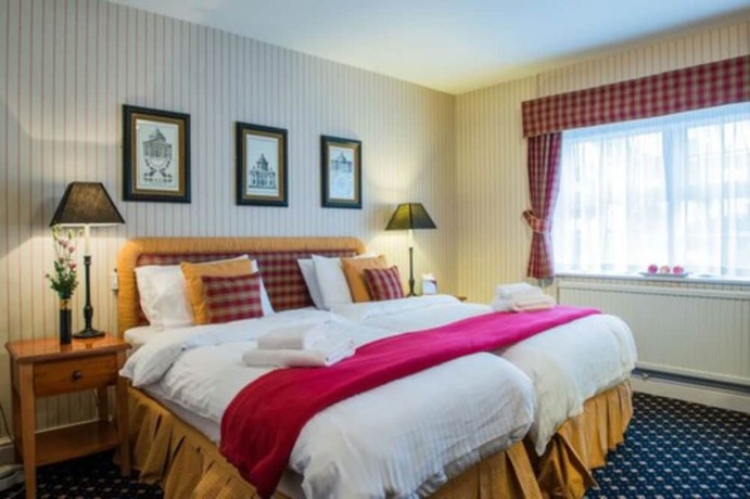 Imagen de la habitación del Hotel The Bear. Foto 10