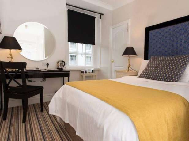 Imagen de la habitación del Hotel The Bear. Foto 12