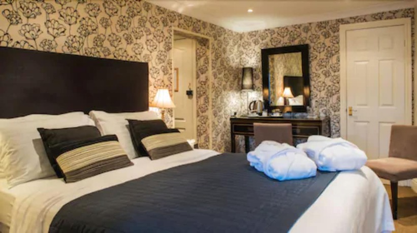 Imagen de la habitación del Hotel The Bear. Foto 14