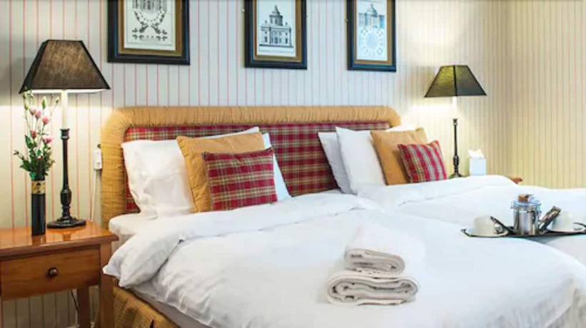 Imagen de la habitación del Hotel The Bear. Foto 16