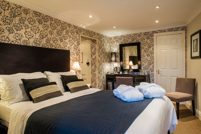 Imagen de la habitación del Hotel The Bear. Foto 19