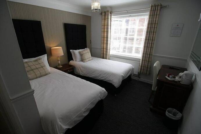 Imagen de la habitación del Hotel The Bear. Foto 9