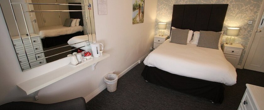 Imagen de la habitación del Hotel The Bear. Foto 10