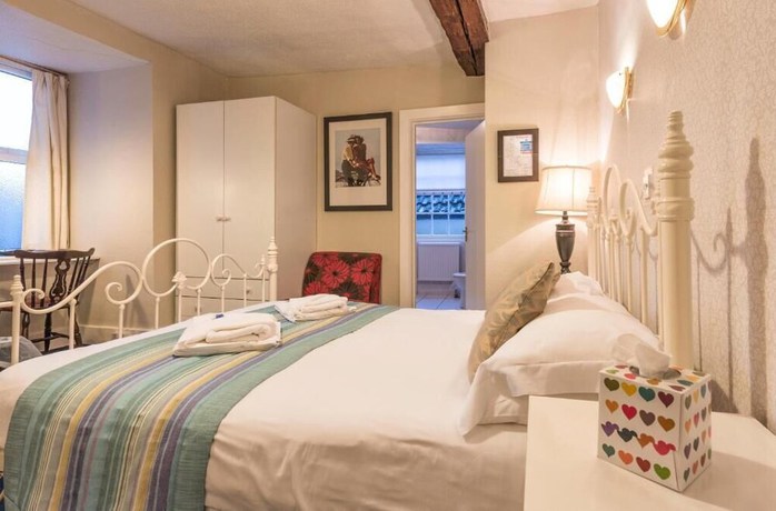 Imagen de la habitación del Hotel The Beaufort. Foto 10