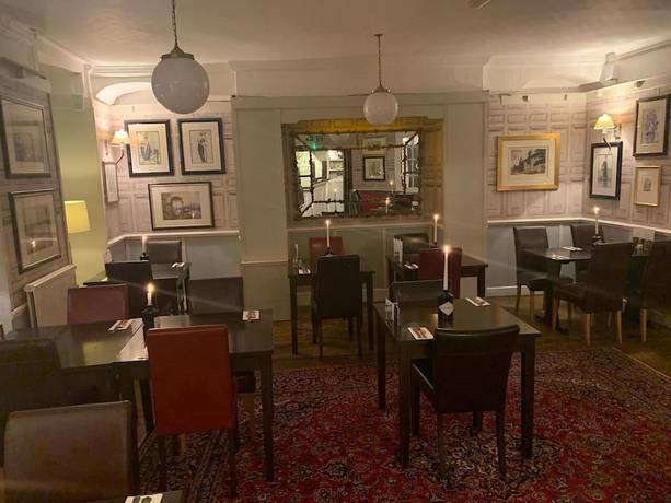 Imagen del bar/restaurante del Hotel The Beaufort. Foto 7
